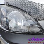 Opel Corsa 02+ Carbon Look Headlight Guard-0