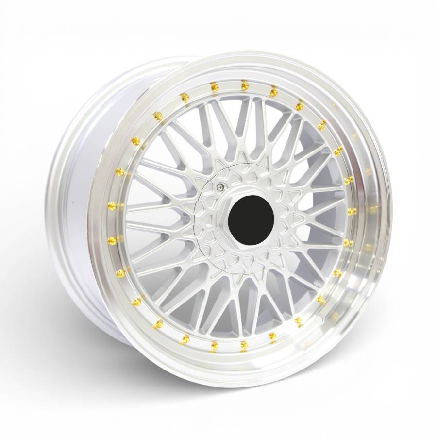 TWC462 63 17" TWC462 4/100 & 4/108 Silver Machine Lip With Gold Rivets Alloy Wheels - Image 1