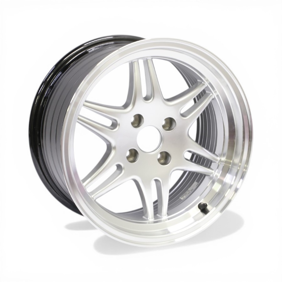 M8580 15 15" M8580 4/100 Hyper Silver Machined Lip Alloy Wheels - Image 1