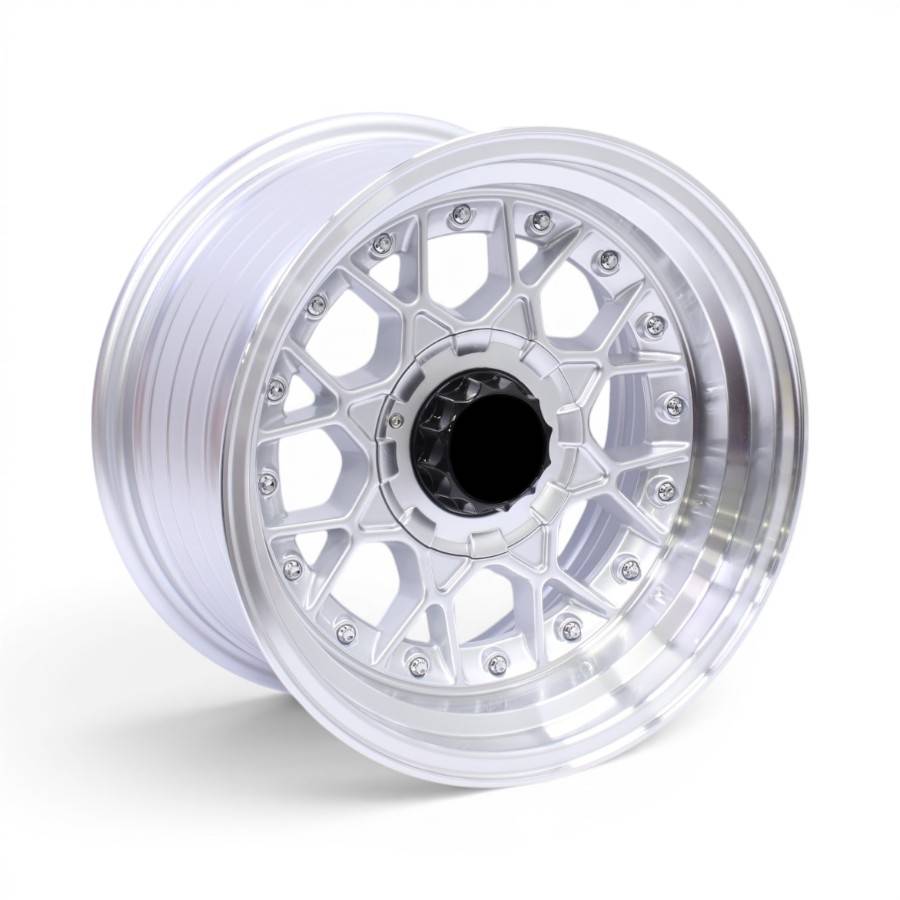 M8947 15" M8947 4x100 & 4x108 Silver Polished Lip with Rivets Alloy Wheels - Image 1